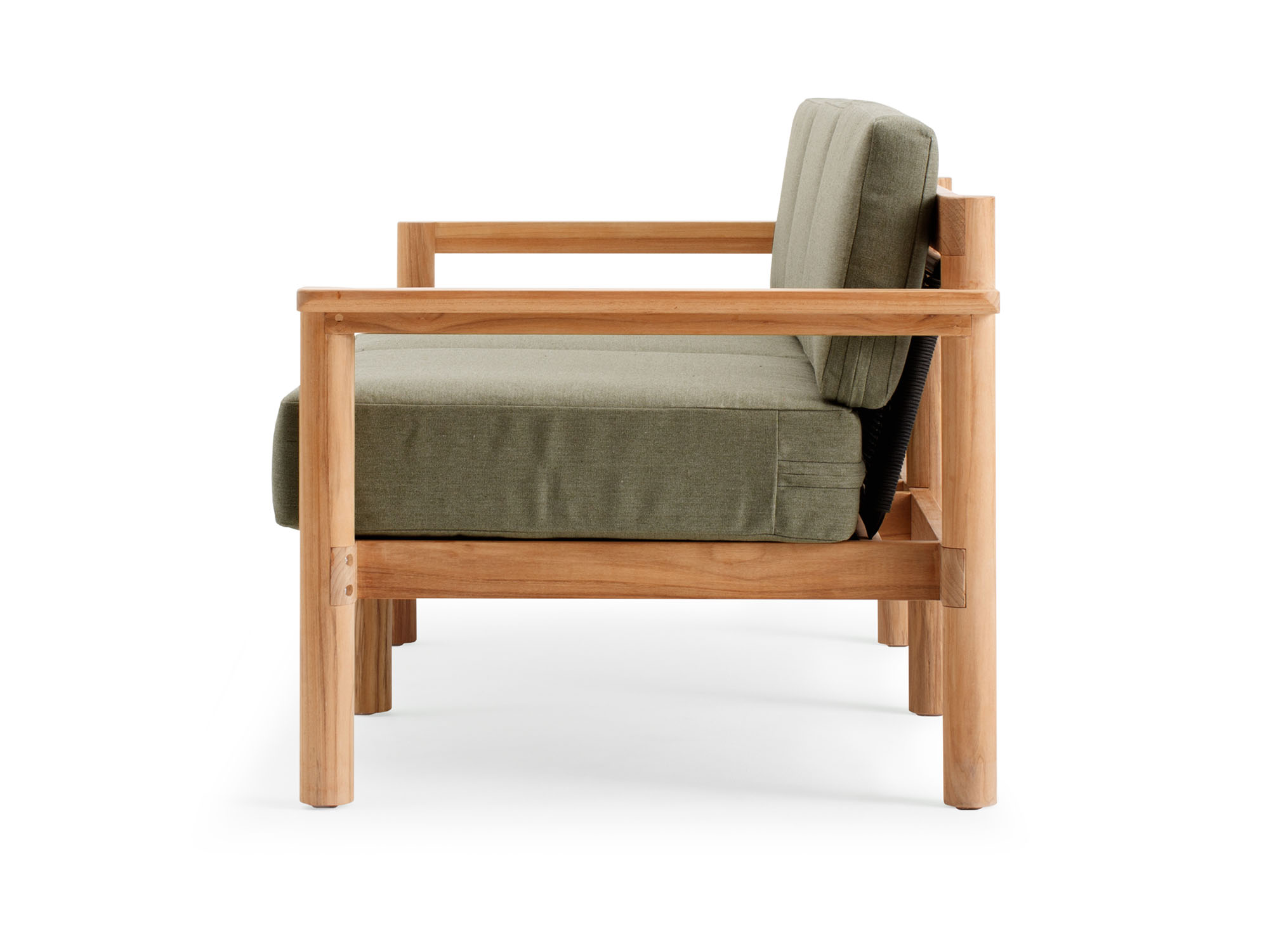 Side view of outdoor sofa with green cushions